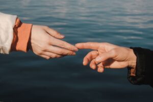 hands touch connection close up
